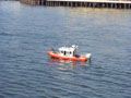 coast guard gun inflatable dinghy wtf.jpg
